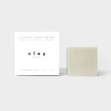 Load image into Gallery viewer, SUSSEX SOAP HOUSE Formulated with mineral-rich clays, nourishing organic plant oils &amp; a cleansing citrus blend of bergamot, lemon, &amp; rosemary essential oils, our gently exfoliating clay bar draws impurities, tones &amp; clarifies the skin with a fresh and fragrant lather cube
